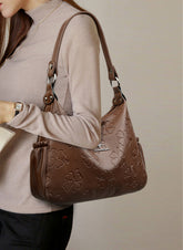 حقيبة يد نسائية ذات نقوش بارزة حجم متوسط لون بني - KSA